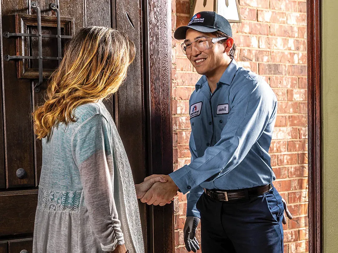 Home owner greeting a Service Experts technician